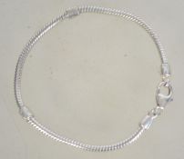 A silver snake linked bracelet with lobs