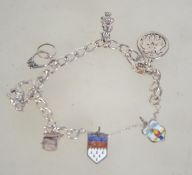 A silver white metal charm bracelet with