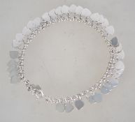 A contemporary silver ladies charm brace