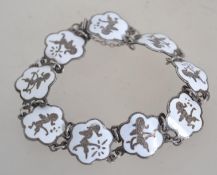 A sterling silver bracelet with white en