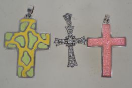 A group of three silver 925 crucifix nec