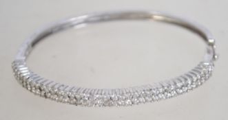 A silver 925 bangle bracelet set with tw