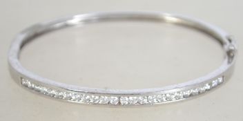 A silver 925 bangle bracelet with inset