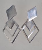 A pair of silver 925 metamorphic diamond