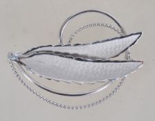 A contemporary Canadian silver brooch wi