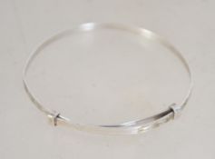 A silver childs christening bracelet of