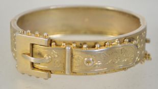 A Victorian silver gilt buckle bracelet having Birmingham assay marks, makers marks for H.