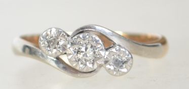 A vintage 9ct gold and platinum diamond ring.