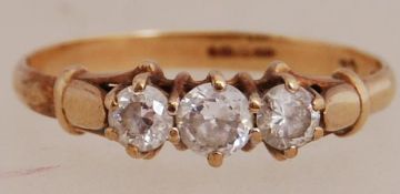 A 9ct gold CZ trilogy ring. Hallmarked Birmingham pat pending expanding shank. Size S.
