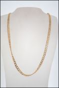A hallmarked 9ct gold diamond cut curb link chain necklace. Hallmarked for London.