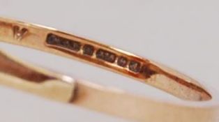 A 9ct gold ring set with an oval cameo. Hallmarked Birmingham. Size K.