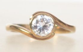 A hallmarked 9ct gold and cz single stone solitaire ring.