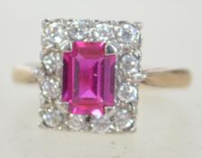 A hallmarked 9ct gold red stone ladies dress ring,