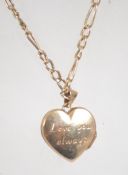 A hallmarked 9ct gold Figaro chain linked necklace with heart locket pendant inscribed ' Love You