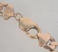 A hallmarked 9ct gold belcher diamond cut kerb linked bracelet with lobster clasp.