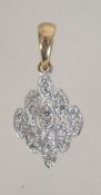 9ct gold Art Deco diamond pendant. Marked 9ct tests 9ct gold. Measures 1.5cms.