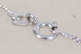 A 9ct white gold diamond and amethyst necklace and pendant. Total weight 3.