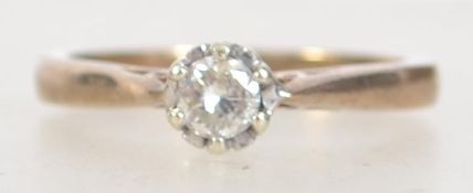 A hallmarked 9ct gold solitaire diamond ring. Diamond approx .25pts Weight 2.5g. Size M.