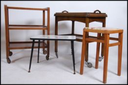 A collection of furniture to include a retro mid c