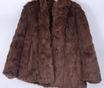 A vintage 20th century ladies hip length fur coat