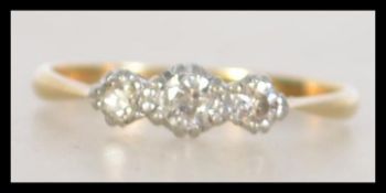An 18ct gold and platinum vintage ladies ring by T