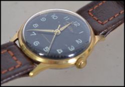 A vintage mid century Gentlemans Gladiator wristwa