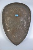 A decorative wall hanging  plaster shield decorate