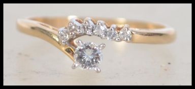 A 14ct gold and diamond ring with approx 15pts dia