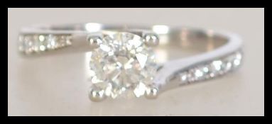 A 585 marked 14ct white gold diamond solitaire rin