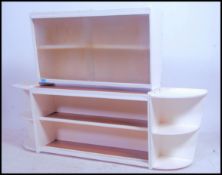 A set of two vintage mid 20th century kitchen wall