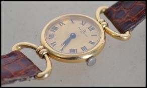 A ladies 18ct gold Baume & Mercier wristwatch - dr