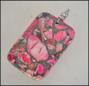 An unusual 20th century Chinese pink jasper neckla