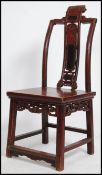 A 19th century Chinese laquered horseshoe chair ha