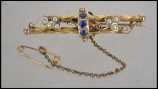 An Edwardian 9ct gold blue stone and pearl brooch
