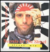 A Signed Nils Lofgren 12