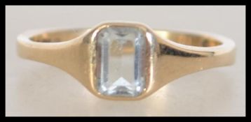 A 9ct gold aquamarine ladies dress ring having Lon
