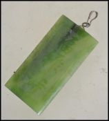 A silver bale Jade necklace pendant with character