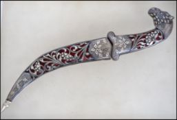 A Silver white metal Persian style dagger with myt