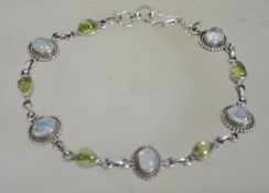 A silver 925 rolo link bracelet chain having alter