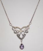 A silver 925 rolo link necklace chain with c clasp having a Celtic knot pendant with faceted