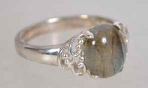 A silver 925 ladies dress ring having central opal
