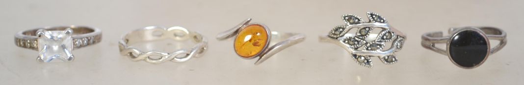 A group of 5 silver 925 ladies rings to include one with a marcasite branch design one with a