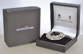 A Mappin and Webb hallmarked silver 925 shield brooch with inner band of knot decoration and