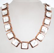 A mid 20th century copper and enamel necklace by Malitisse / Renoir having square panels with