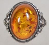 A silver 925 ladies dress ring having a large cent