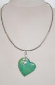 A fantastic silver 925 rigid cocoon link necklace chain with large malachite heart shaped drop