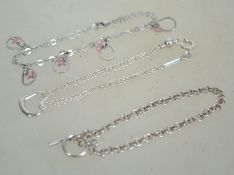 A group of three silver 925 bracelet chains to include a rolo link chain with toggle clasp measuring