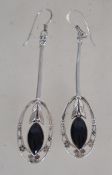 A pair of silver 925 ladies drop earrings having a naturalistic oval design with flowered border