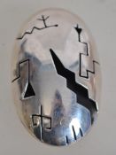 A silver 925 Aztec inspired shield / lozenge brooch having way point carving and lightning bolt