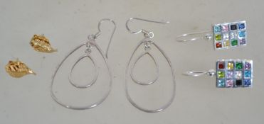 Three pairs of silver 925 earrings to include a double drop tear drop pair, a contemporary pair